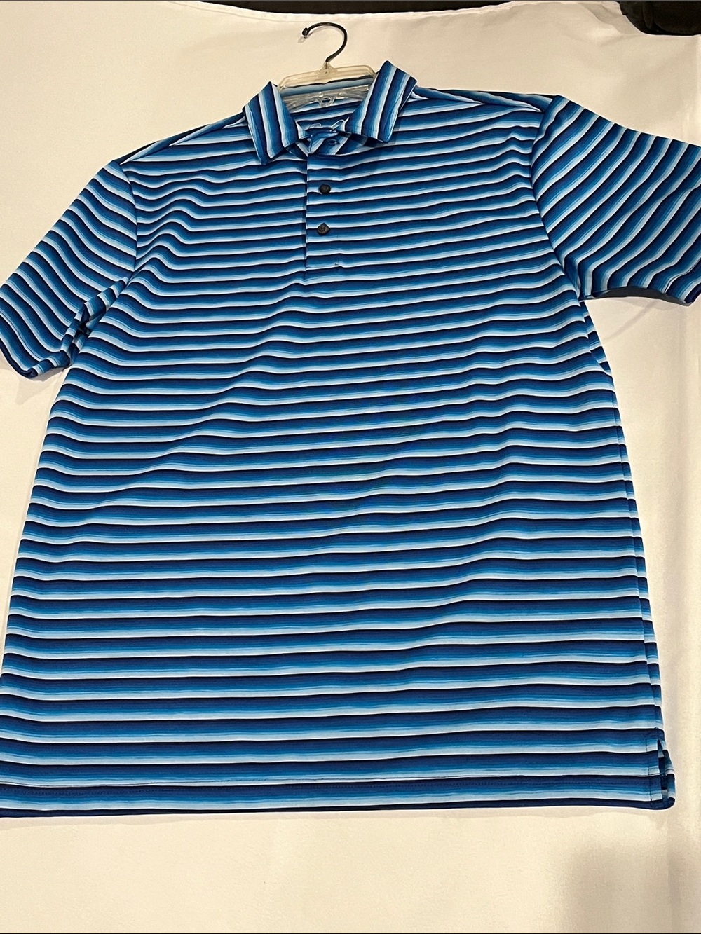 Arnold Palmer polo shirt in a blue striped pattern & signature umbrella logo M